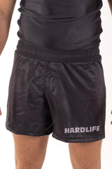 Image of Black Hardlife MMA Shorts - adults-shorts: <p class="MsoNormal">Step into your next challenge with our Hardlife Shorts, designed to meet the demands of any athlete