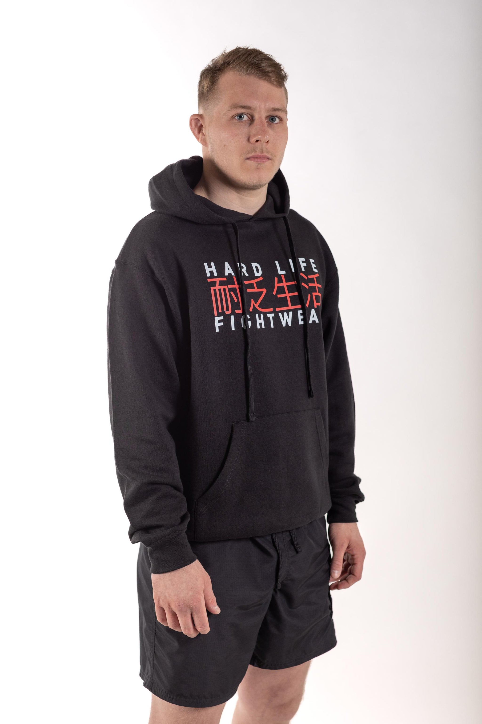 Image of Hardlife Original Hoodie - hardlife-original-hoodie: Wrap yourself in the comfort and style of the Hardlife Essential Hoodie, a versatile addition to any athlete's wardrobe