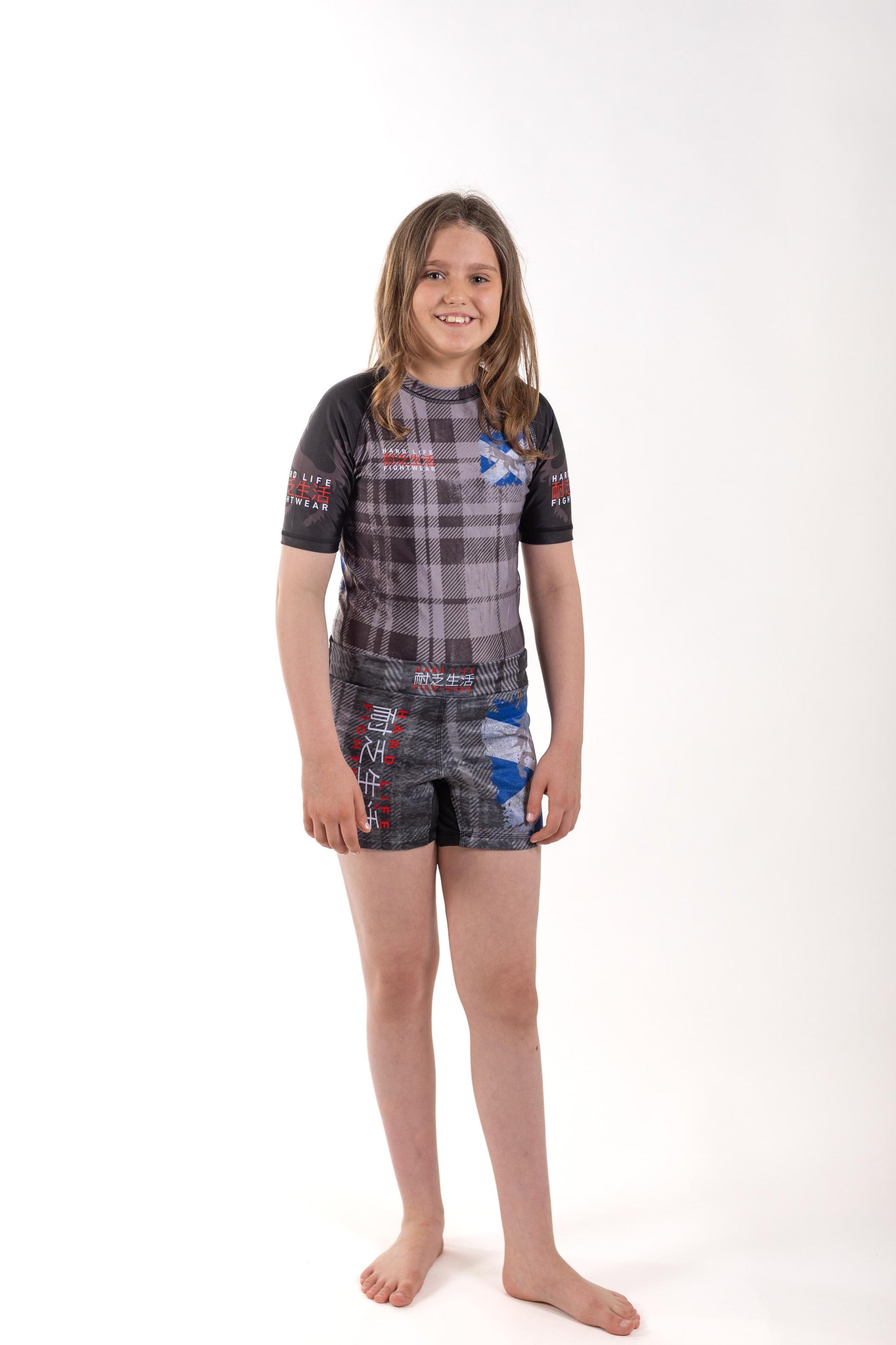 Image of Hardlife Kids Scottish Rashguard & Shorts MMA Kit - hardlife-kids-scottish-rashguard-shorts-mma-kit: Equip your young champion with the Hardlife Kids' Scottish Kit Bundle, featuring the Scottish Rashguard and Shorts